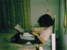 Photo of Debbie Moeller working on a college assignment